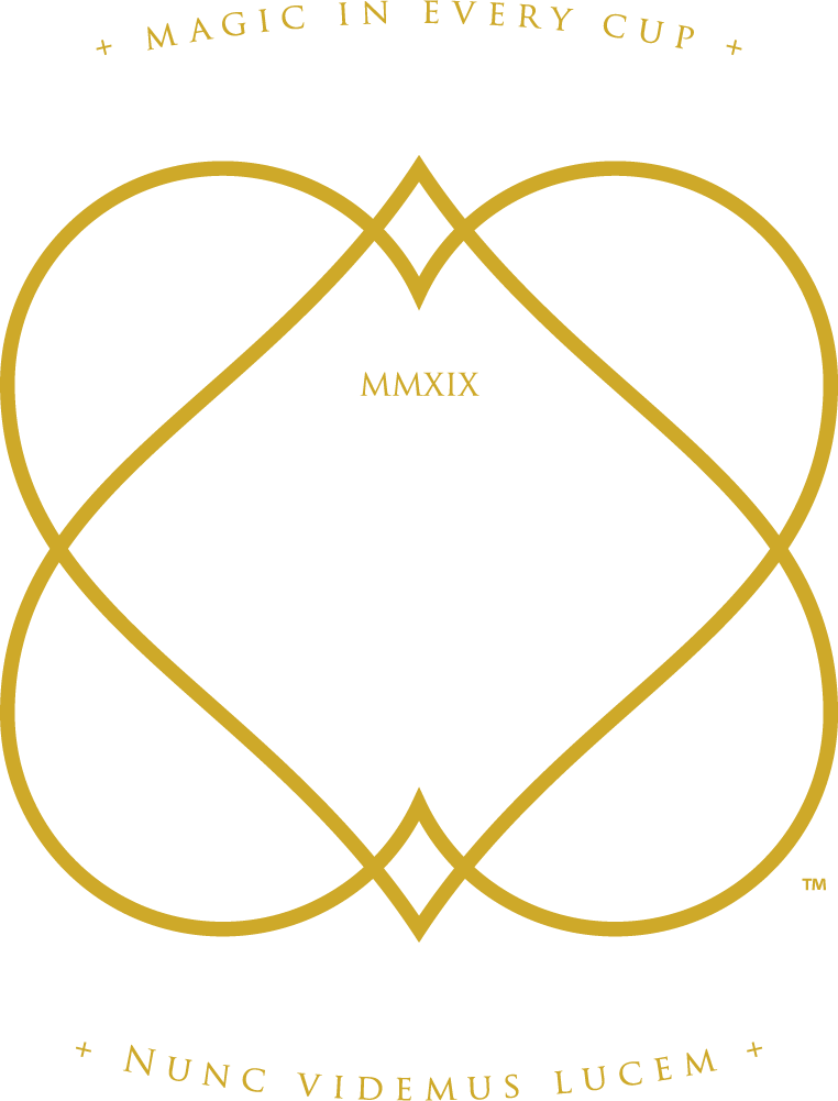 FeelLove Coffee logo featuring a gold crest, transparent background, and white text, representing quality artisan coffee, tea, and French pastries.